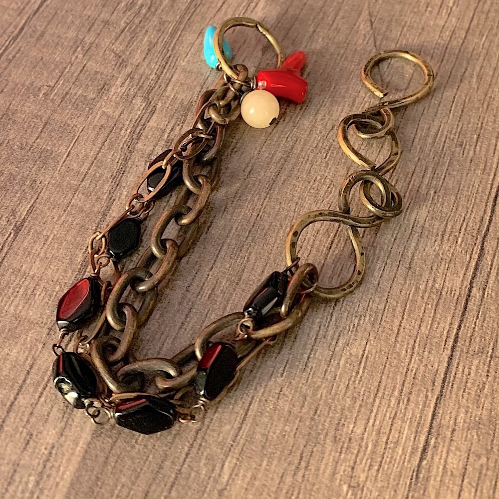 Bracelet handmade with multiple chains and beads